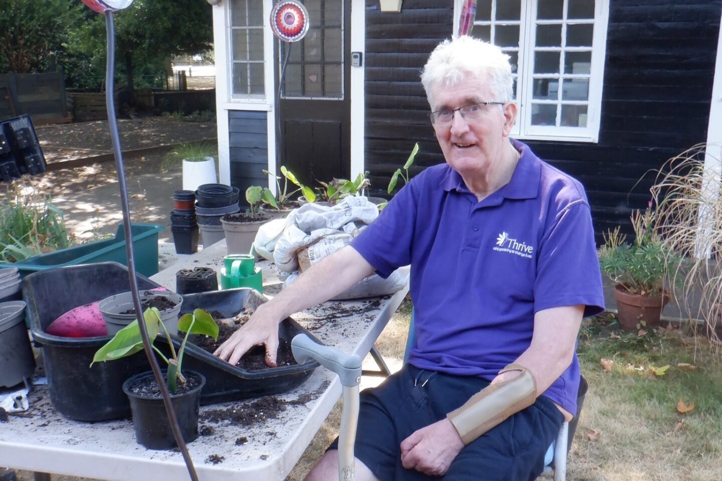 Stephen London stroke survivor potting up