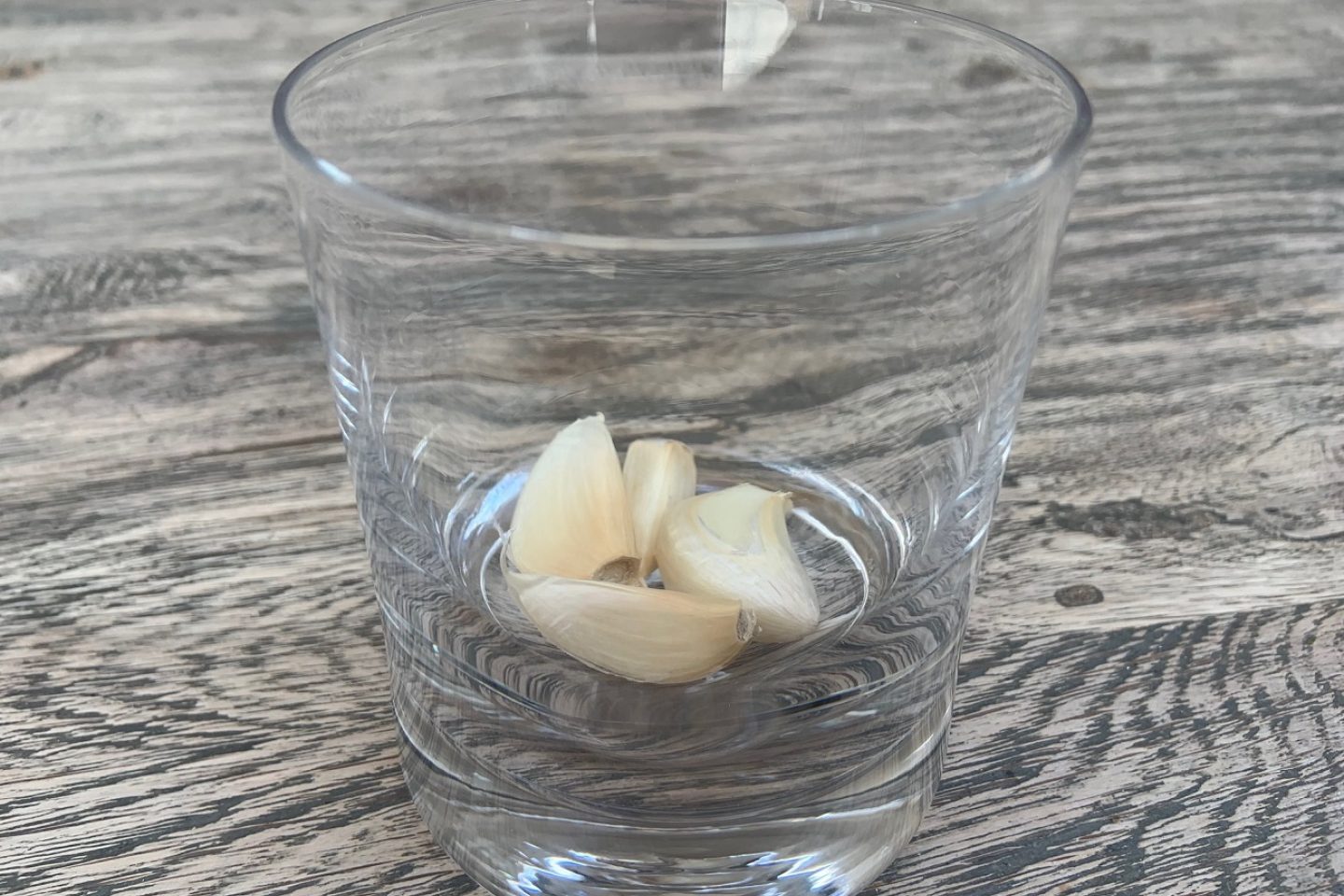 Garlic cloves in a glass jar