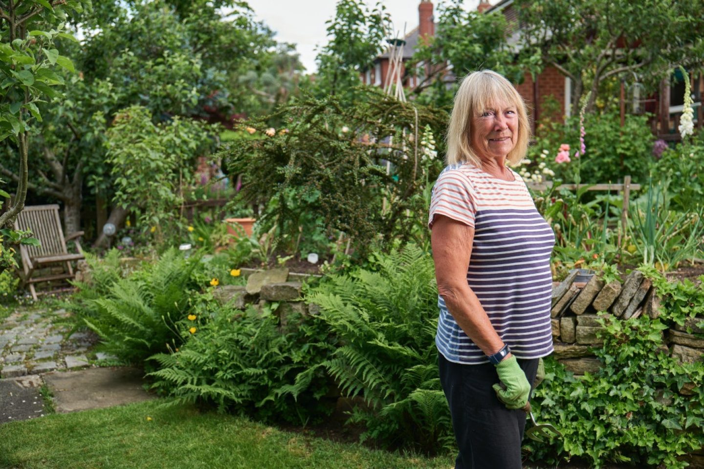 A person standing in a garden